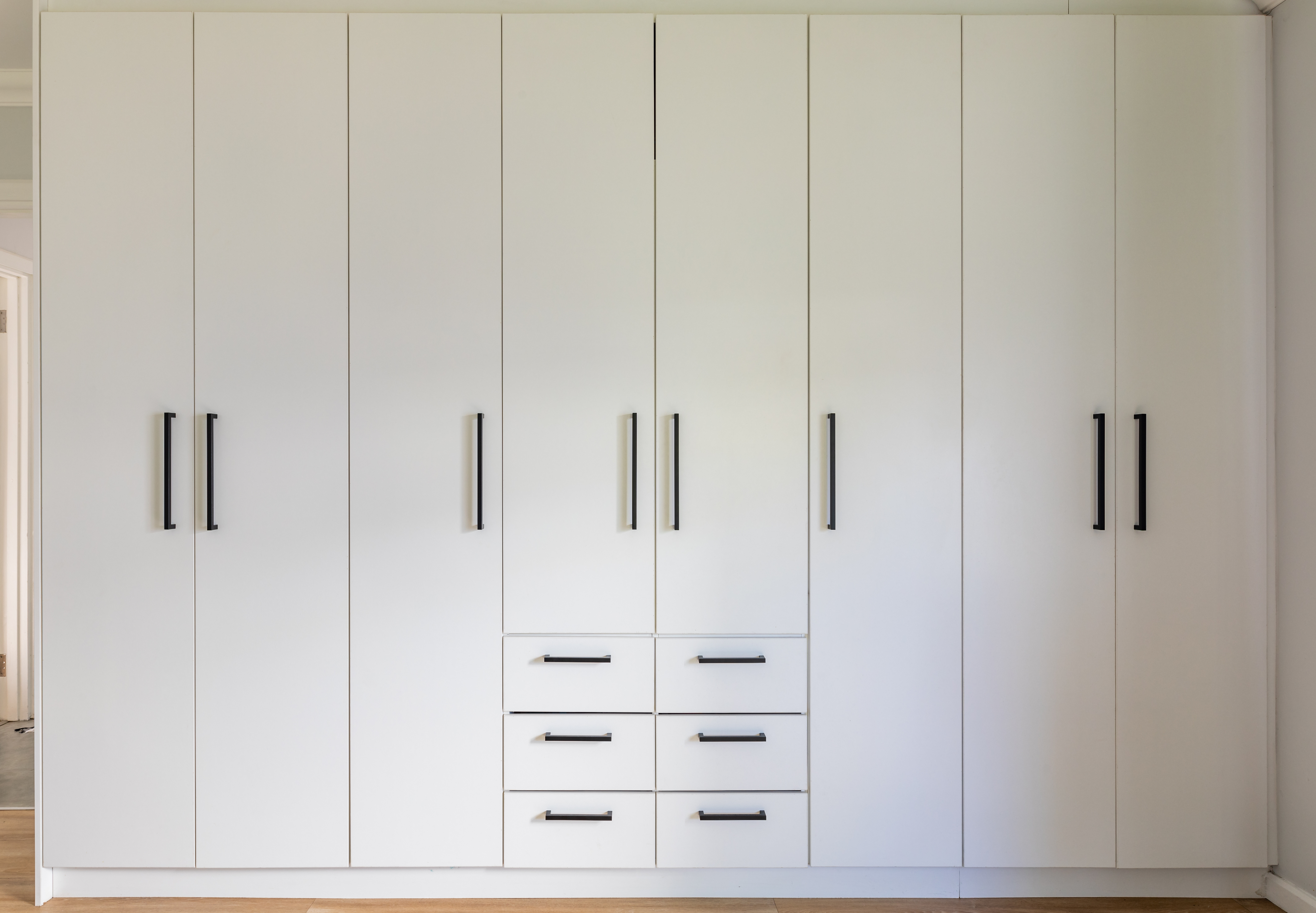 Cabinet hardware installation and finishing